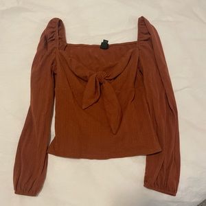 burnt orange long sleeve top women’s size S.